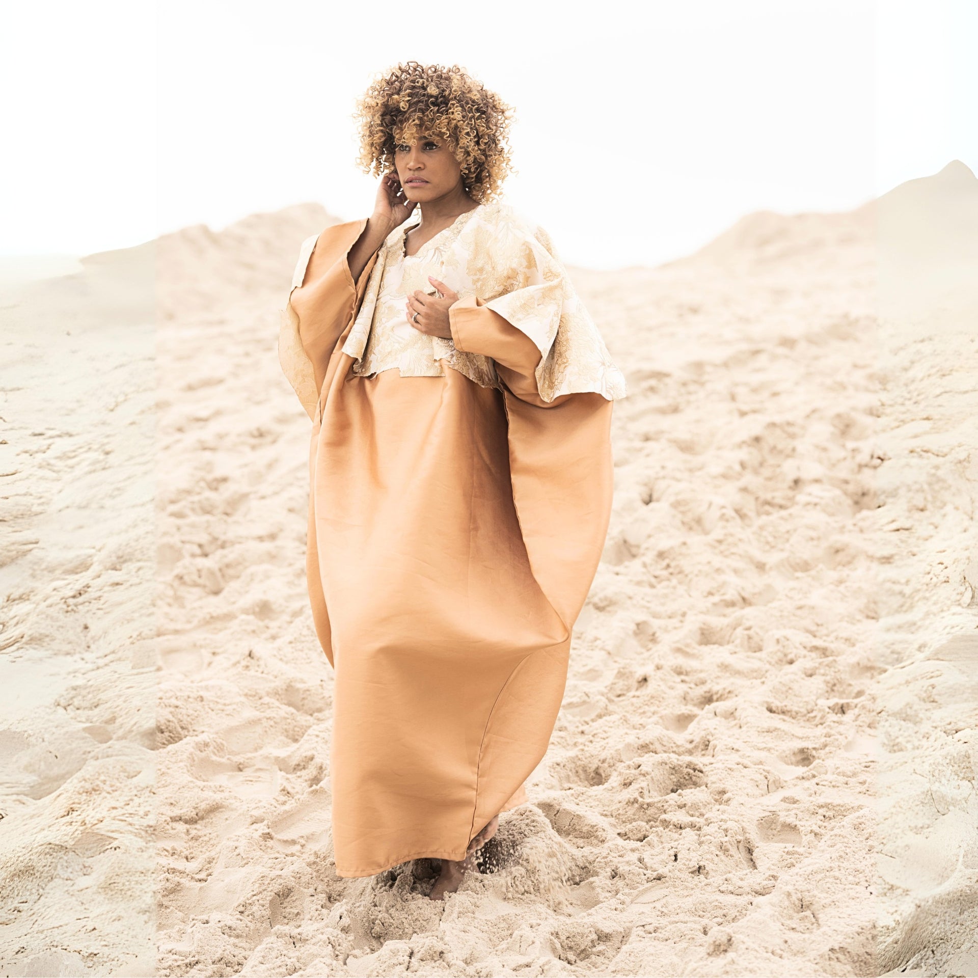 Agbara full-length kaftan in satin fabric with embroidered taffeta layer, inspired by Yoruba Agbada design